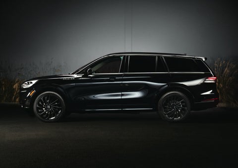 A 2024 Lincoln Aviator® SUV is shown in the Infinite Black exterior color | Palmetto Lincoln in Charleston SC