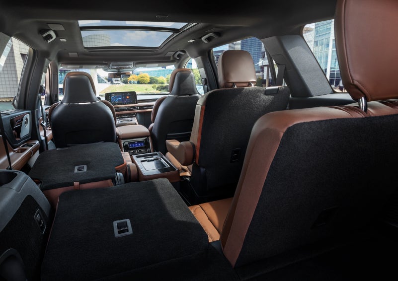 The interior of the 2025 Lincoln Aviator® SUV is shown with two seats folded down for added space. | Palmetto Lincoln in Charleston SC