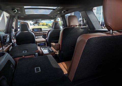 The interior of the 2025 Lincoln Aviator® SUV is shown with two seats folded down for added space. | Palmetto Lincoln in Charleston SC