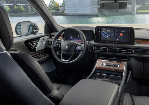 The interior of the 2025 Lincoln Aviator® SUV is shown parked with a view of a harbor through the windshield. | Palmetto Lincoln in Charleston SC