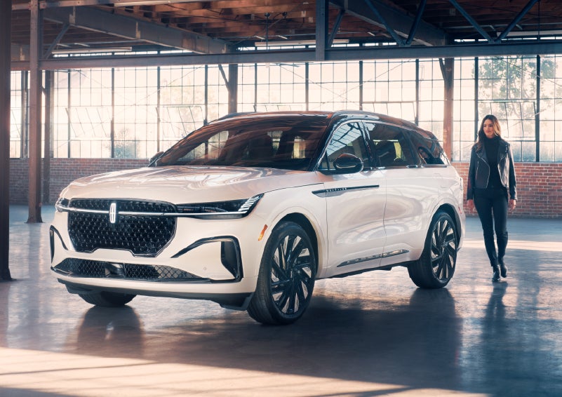 A person approaches a 2025 Lincoln Nautilus® SUV. | Palmetto Lincoln in Charleston SC