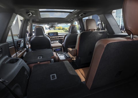 One side of the PowerFold® third-row seat and a second-row seat are folded forward in the 2026 Lincoln Aviator® SUV. | Palmetto Lincoln in Charleston SC