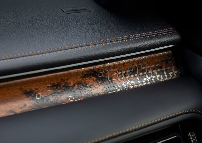 A close-up shot of the 2026 Lincoln Aviator® dashboard with unique black and brown accents and brown stitching. | Palmetto Lincoln in Charleston SC