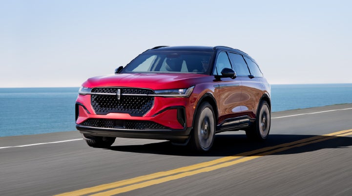 A 2026 Lincoln Nautilus® SUV is being driven on a seaside roadway. | Palmetto Lincoln in Charleston SC