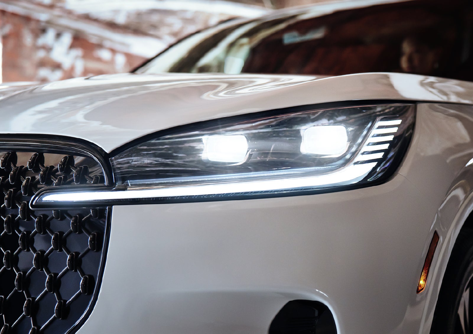 A close-up of a headlamp on the 2027 Lincoln Aviator® SUV is shown. | Palmetto Lincoln in Charleston SC