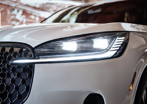 A close-up of a headlamp on the 2027 Lincoln Aviator® SUV is shown. | Palmetto Lincoln in Charleston SC