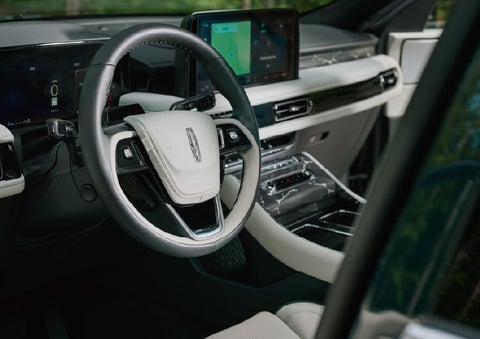 The leather-trimmed steering wheel of a 2027 Lincoln Aviator® Black Label™ SUV. | Palmetto Lincoln in Charleston SC